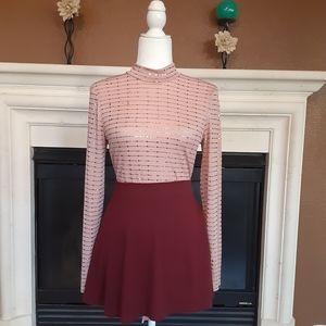 Pink sequent body suit